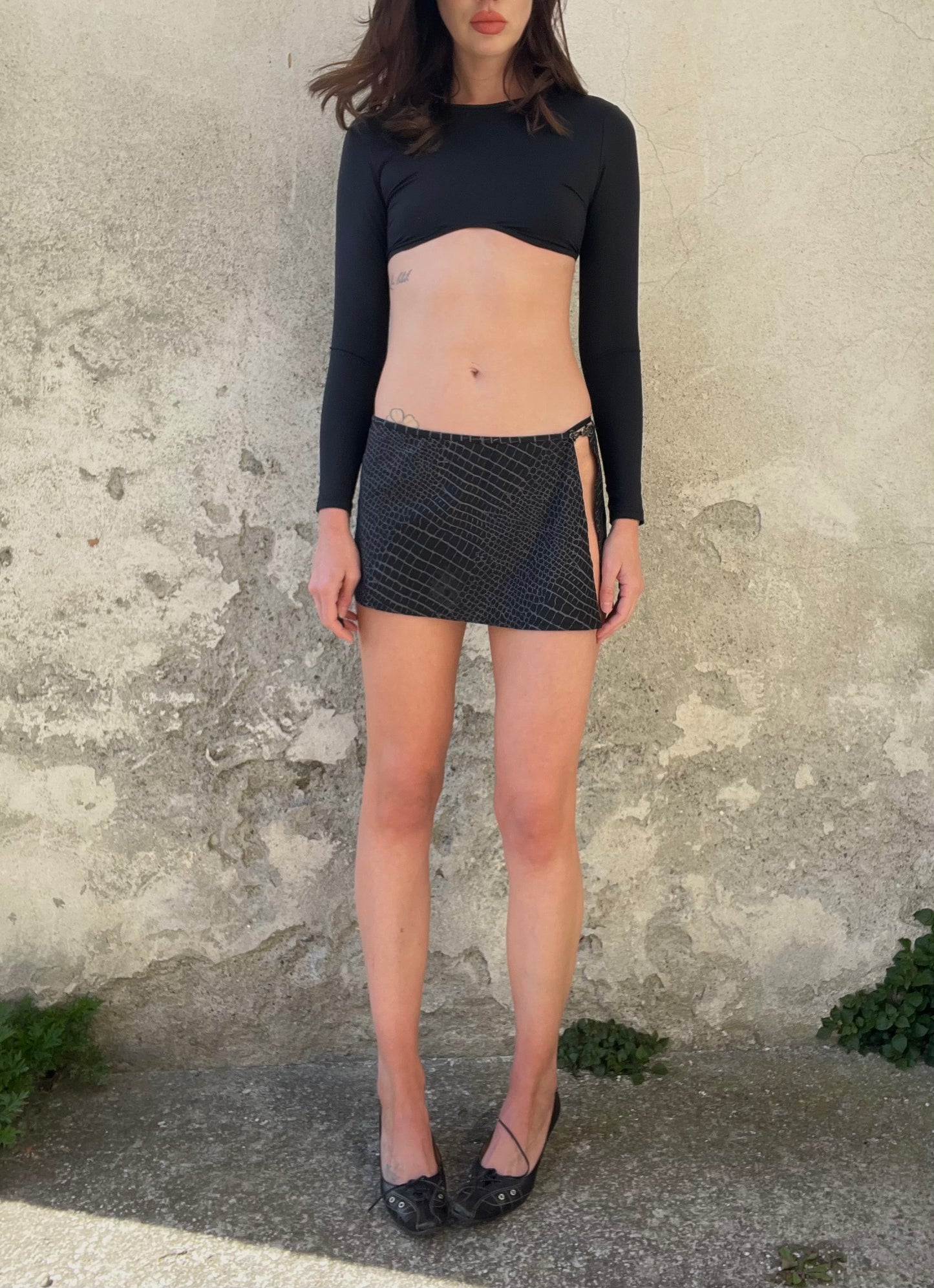 VERSACE Medusa clasp python mini skirt
early 2000s