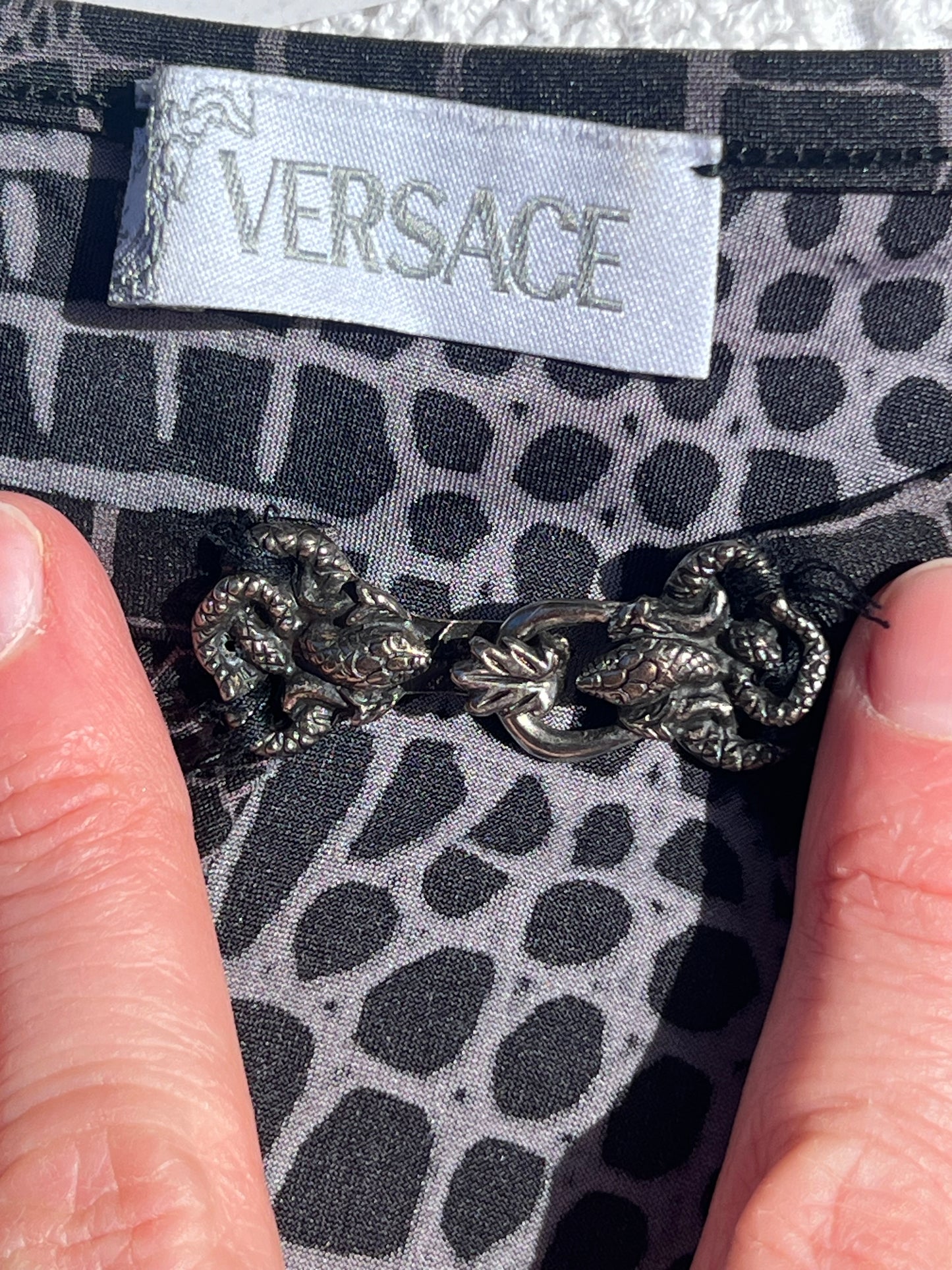 VERSACE Medusa clasp python mini skirt
early 2000s